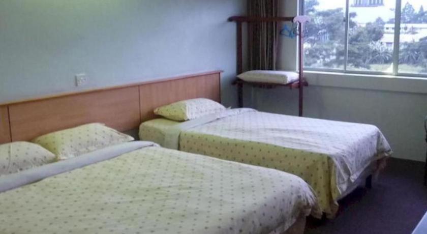 Hotel Hung Hung Кучинг Экстерьер фото