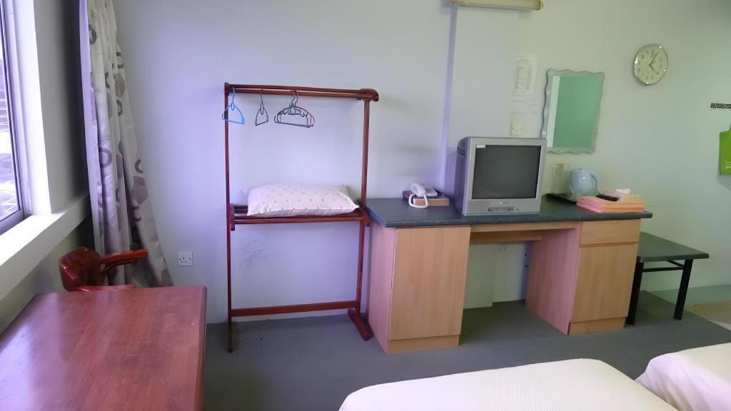 Hotel Hung Hung Кучинг Экстерьер фото