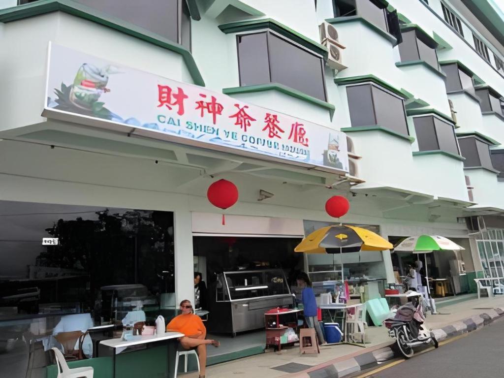 Hotel Hung Hung Кучинг Экстерьер фото