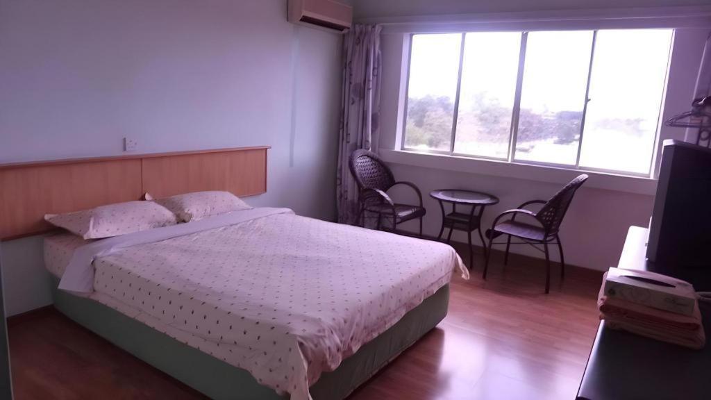 Hotel Hung Hung Кучинг Экстерьер фото